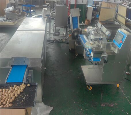İyi bir fiyat. Tam Otomatik Protein Topu Çikolata Üretim Hattı Verimli Yüksek Verim çevrimiçi